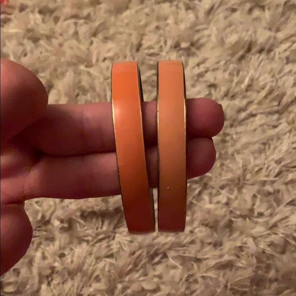 Two Orange Cuff Bracelets